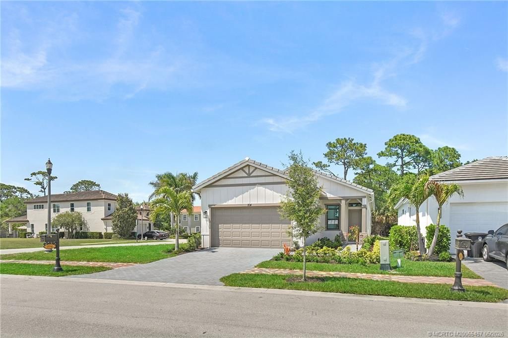 Photo of 104 SE Strada Cervaro, Port Saint Lucie, FL 34952 (MLS # M20055457)