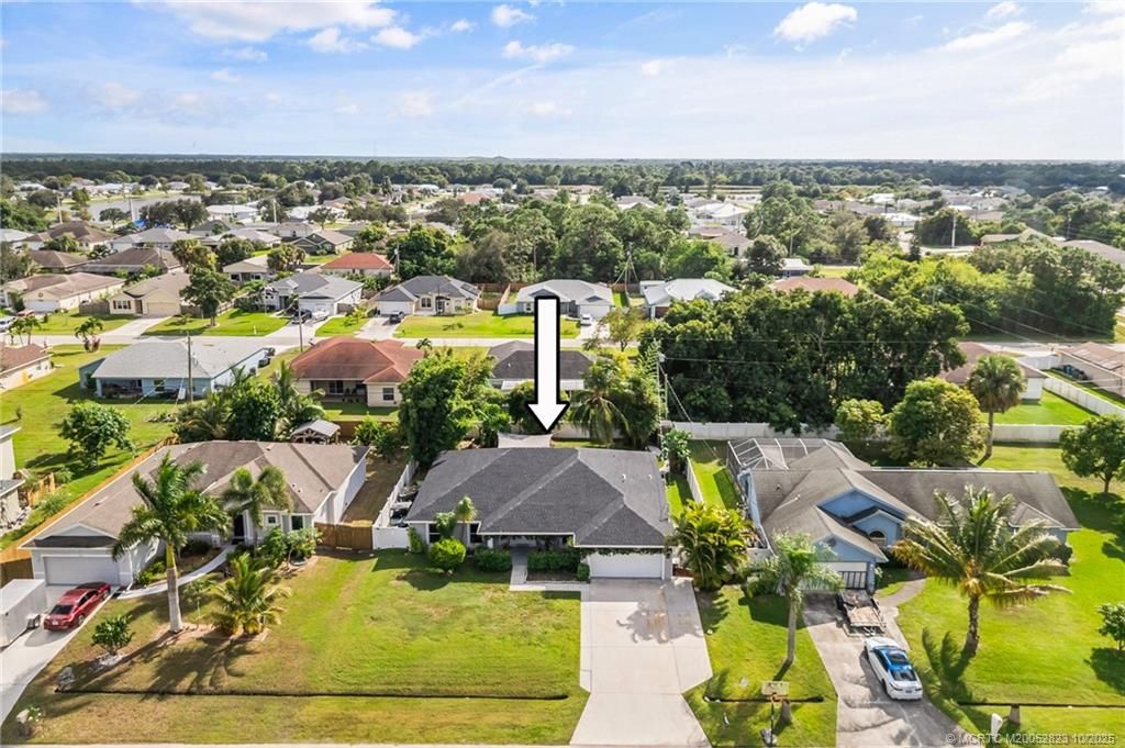 Photo of 1074 SW Eckard Avenue, Port Saint Lucie, FL 34953 (MLS # M20052823)