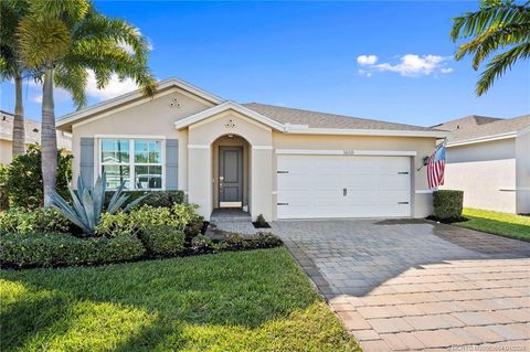 Photo of 1610 NE Skyhigh Terrace, Jensen Beach, FL 34957 (MLS # M20053664)