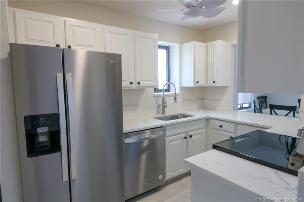 Photo of 5303 SW Miles Grant Road #204, Stuart, FL 34997 (MLS # M20046126)