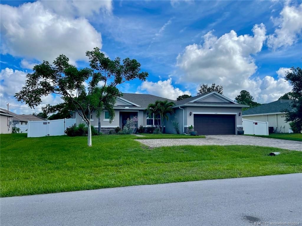 Photo of 1149 SW Hunnicut Avenue, Port Saint Lucie, FL 34953 (MLS # M20045680)