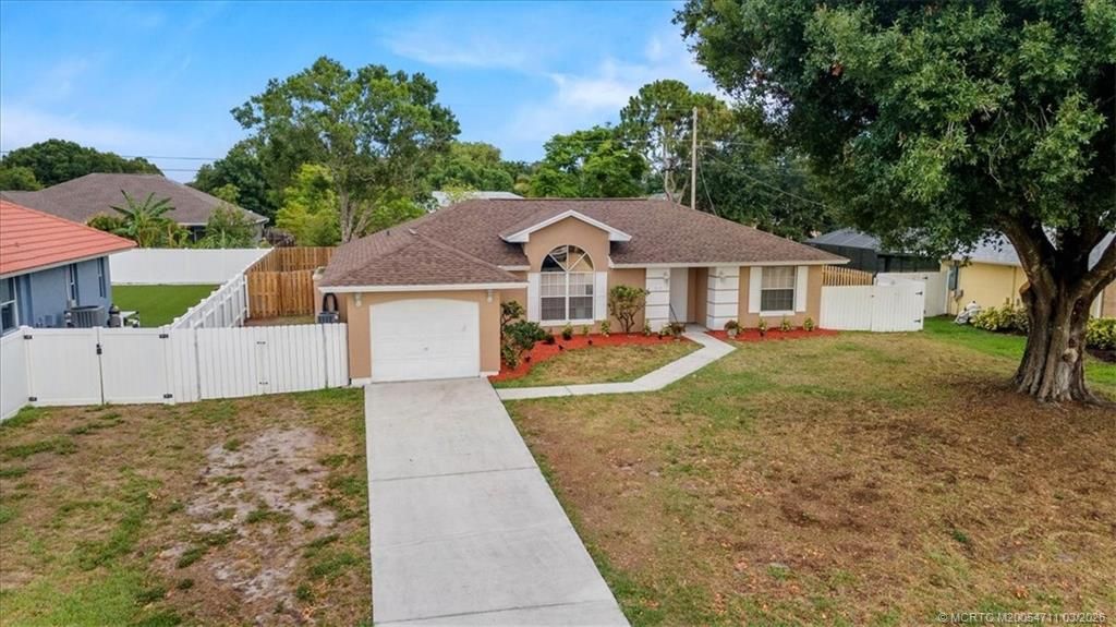 Photo of 517 SW College Park Road, Port Saint Lucie, FL 34953 (MLS # M20054711)