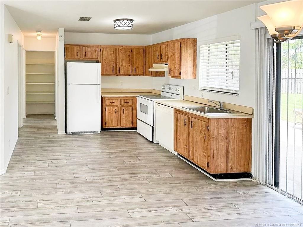 Photo of 2141 SE Flagstone Court, Port Saint Lucie, FL 34952 (MLS # M20041633)
