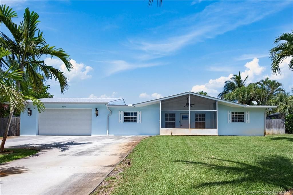 Photo of 4245 NE Sunset Drive, Jensen Beach, FL 34957 (MLS # M20051218)