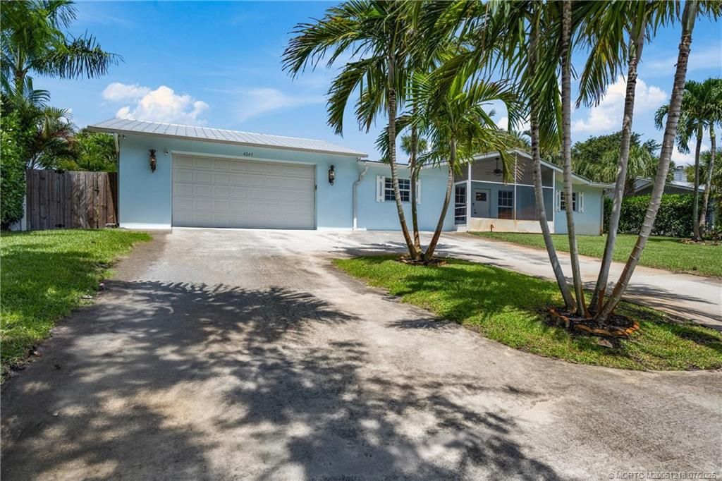 Photo of 4245 NE Sunset Drive, Jensen Beach, FL 34957 (MLS # M20051218)