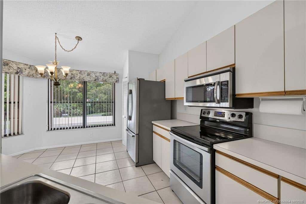 Photo of 3410 SE Martinique Trace #201, Stuart, FL 34997 (MLS # M20056504)