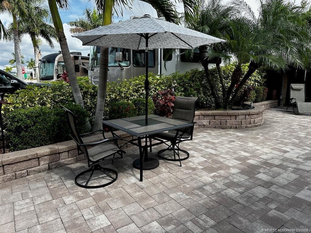 Photo of 154 NW Hazard Way, Port Saint Lucie, FL 34986 (MLS # M20054890)