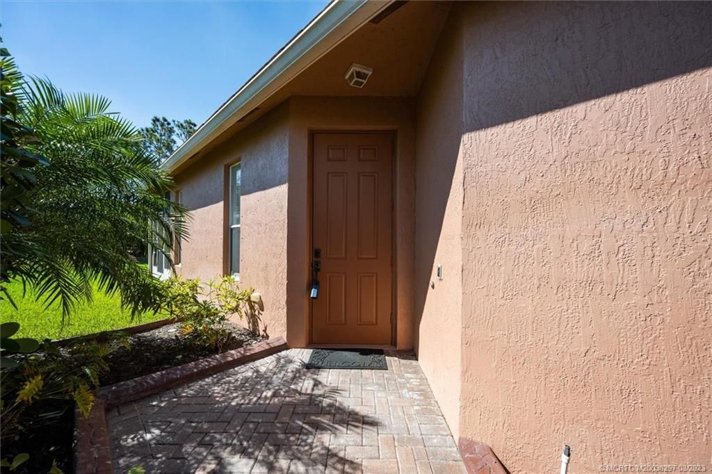 Photo of 10105 SW Brookgreen Drive, Port Saint Lucie, FL 34987 (MLS # M20038297)