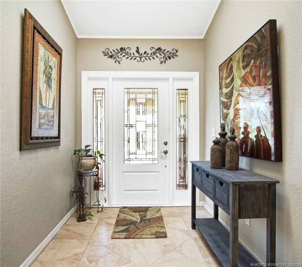 Photo of 2425 SE Issac Road, Port Saint Lucie, FL 34952 (MLS # M20047831)