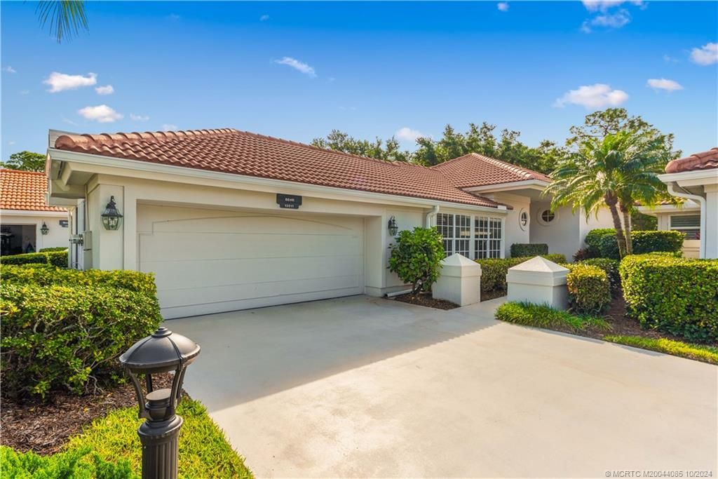 Photo of 13011 Harbour Ridge Boulevard, Palm City, FL 34990 (MLS # M20044085)