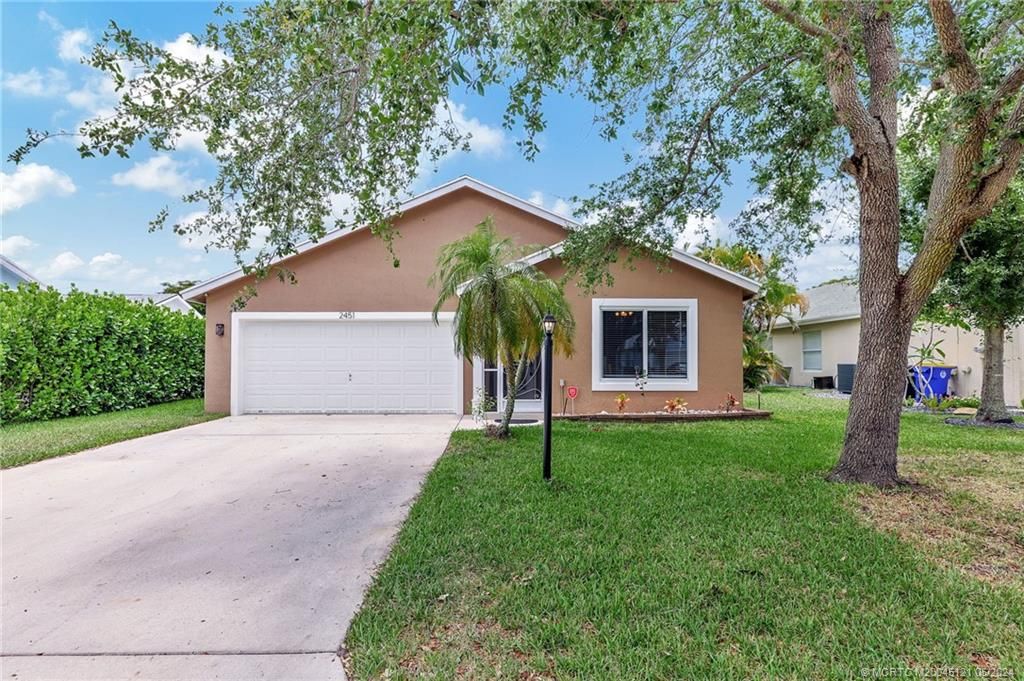 Photo of 2451 SW Plymouth Way, Stuart, FL 34997 (MLS # M20045121)