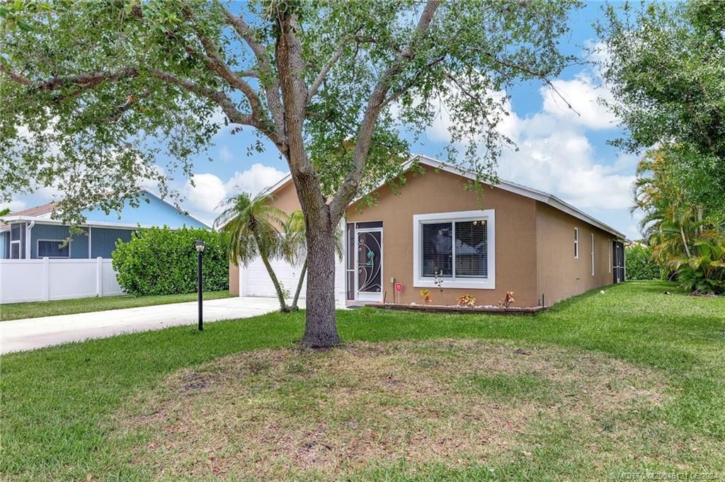 Photo of 2451 SW Plymouth Way, Stuart, FL 34997 (MLS # M20045121)