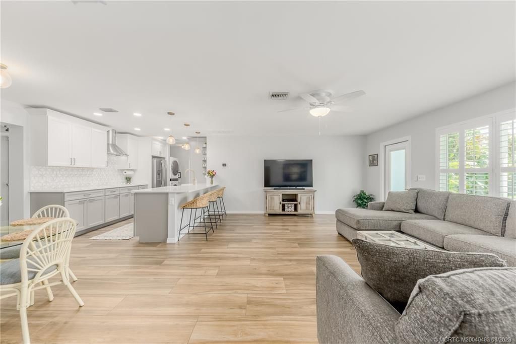 Photo of 1020 NE Key Drive, Jensen Beach, FL 34957 (MLS # M20040483)