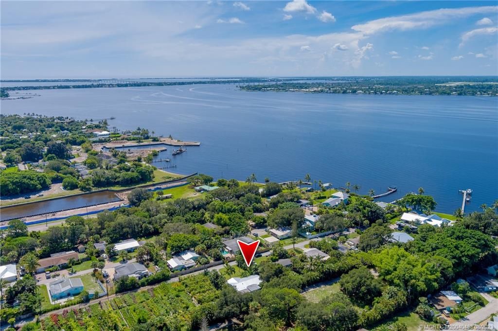 Photo of 1020 NE Key Drive, Jensen Beach, FL 34957 (MLS # M20040483)