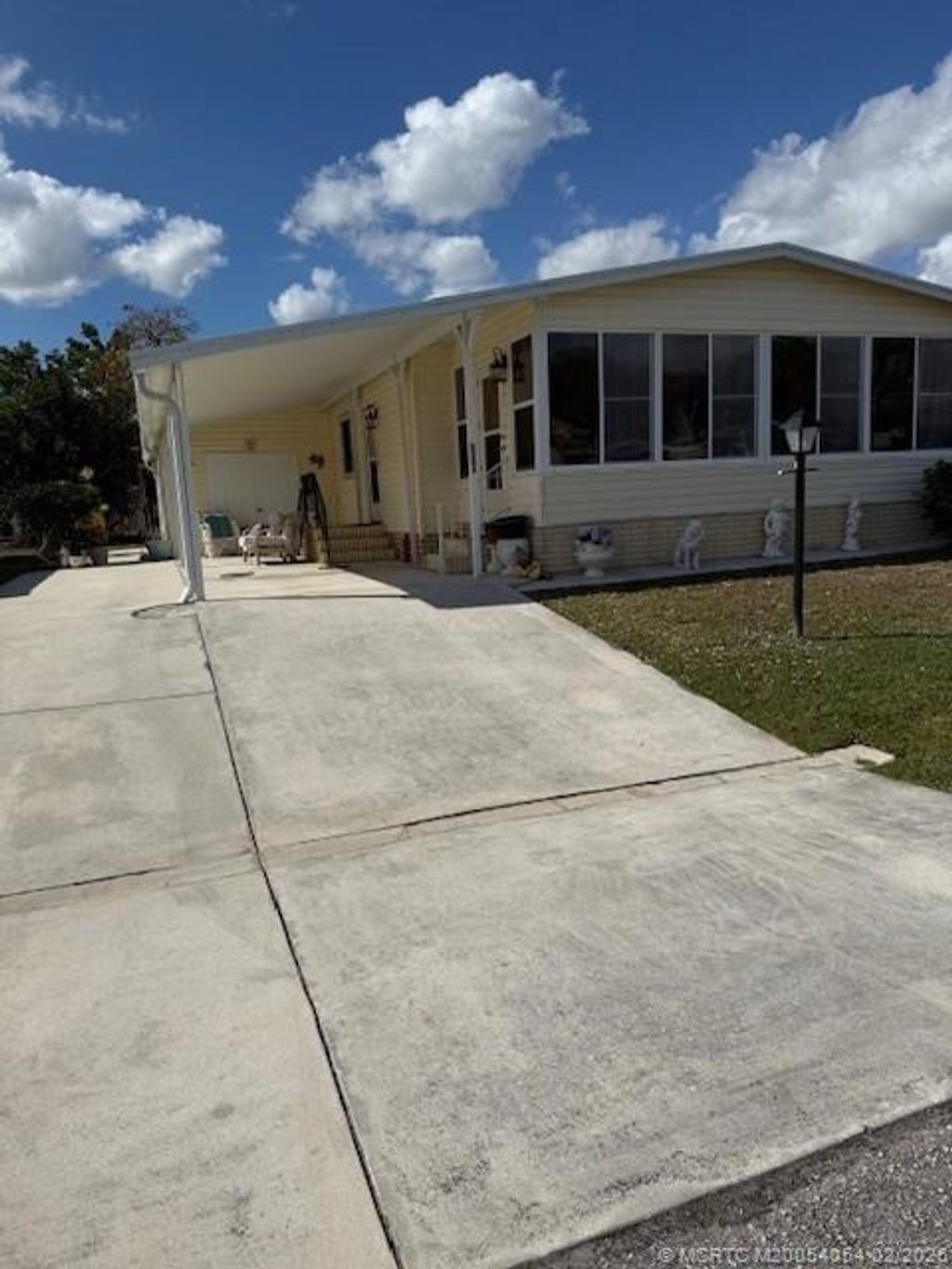 Photo of 8203 E Bitterbush Lane, Port Saint Lucie, FL 34952 (MLS # M20054054)