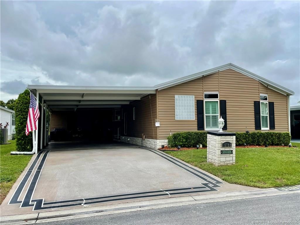 Photo of 16188 SW Indianwood Circle, Indiantown, FL 34956 (MLS # M20055838)