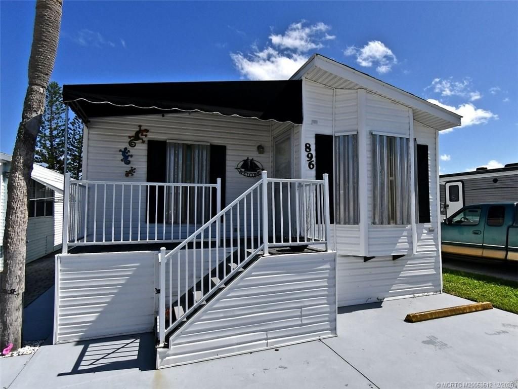 Photo of 896 Nettles Boulevard, Jensen Beach, FL 34957 (MLS # M20053512)