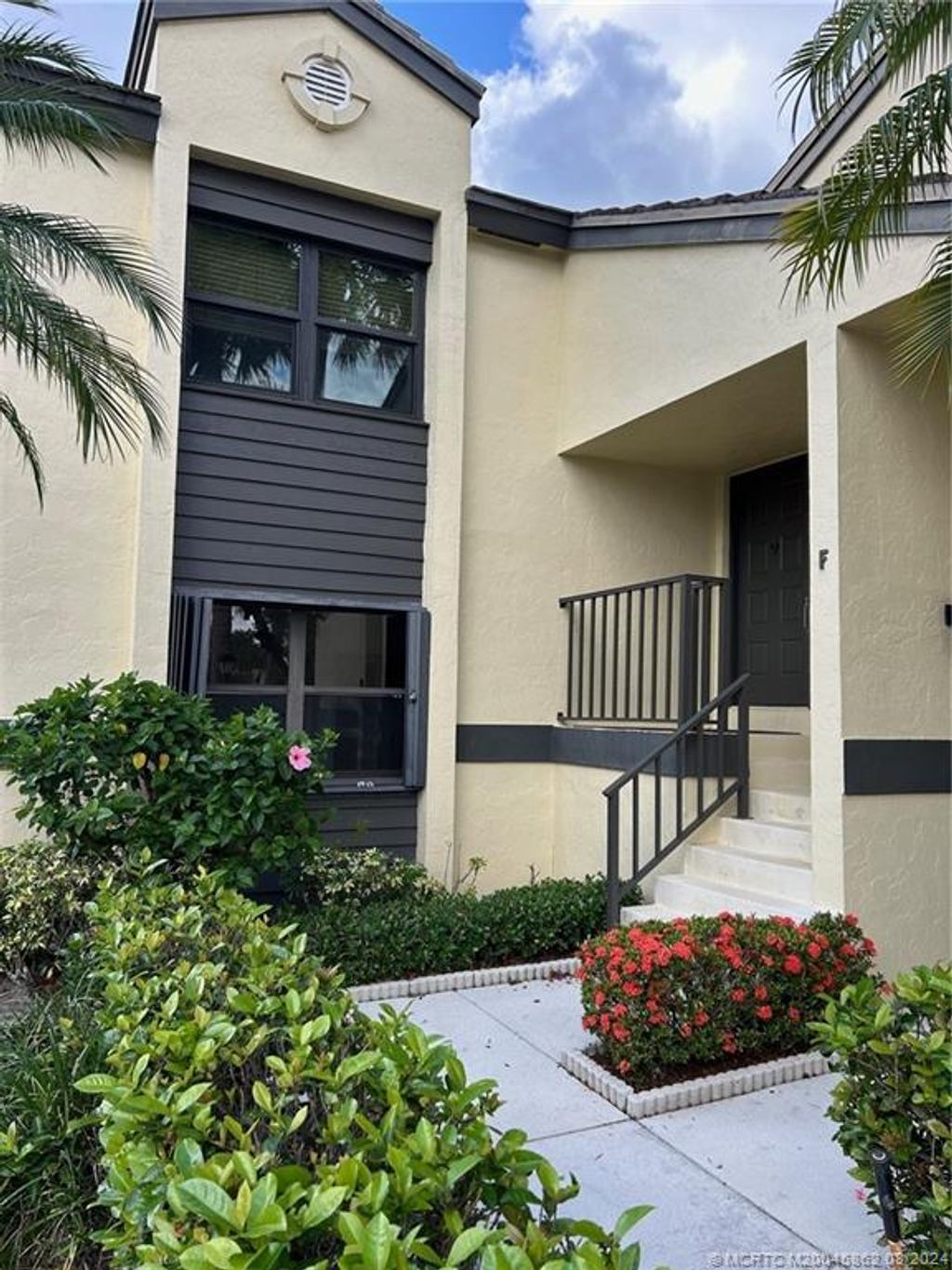 Photo of 3961 SW Greenwood Way #F, Palm City, FL 34990 (MLS # M20045862)