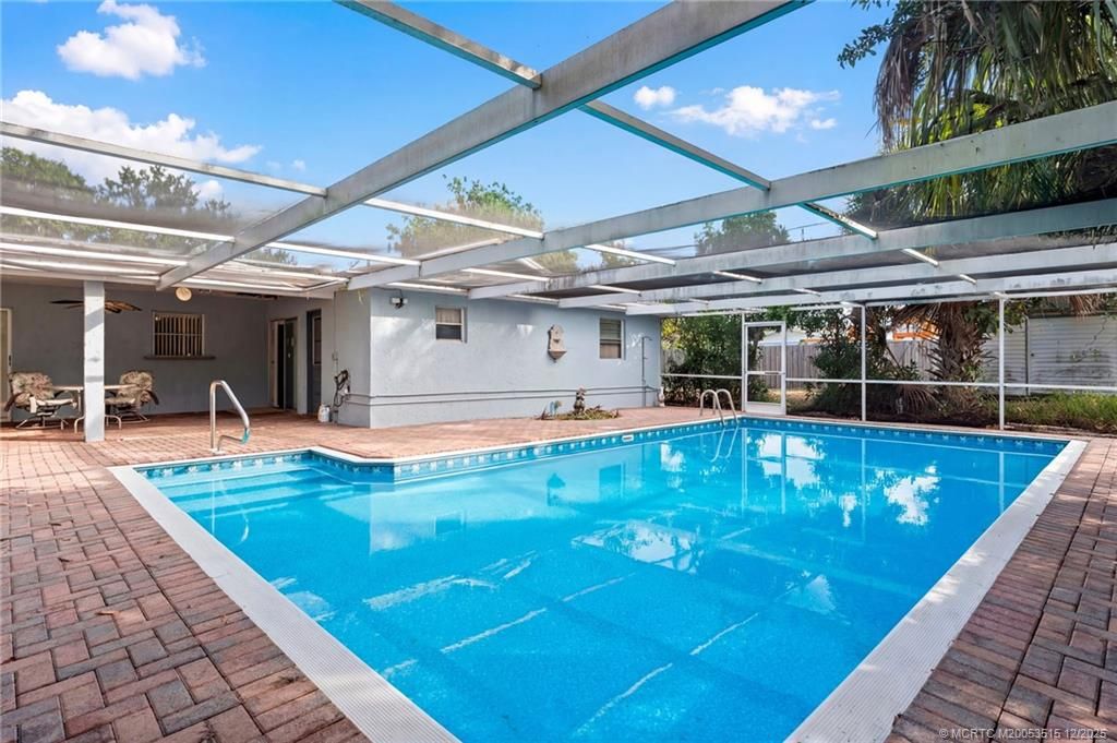 Photo of 1380 NE 29th Terrace, Jensen Beach, FL 34957 (MLS # M20053515)