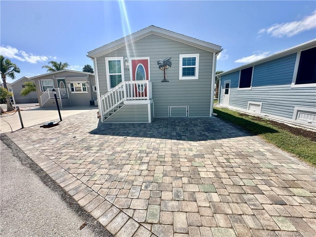 Photo of 754 Nettles Boulevard, Jensen Beach, FL 34957 (MLS # M20044647)