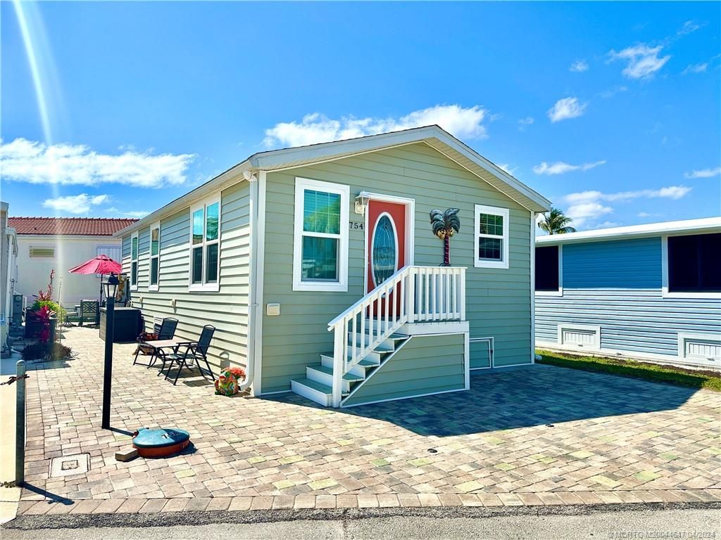 Photo of 754 Nettles Boulevard, Jensen Beach, FL 34957 (MLS # M20044647)