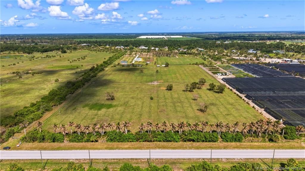 Photo of 10511 SW Citrus Boulevard, Palm City, FL 34990 (MLS # M20055434)
