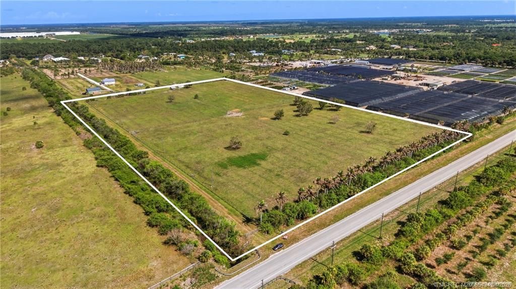 Photo of 10511 SW Citrus Boulevard, Palm City, FL 34990 (MLS # M20055434)