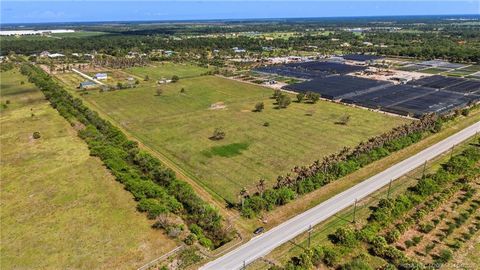 Photo of 10511 SW Citrus Boulevard, Palm City, FL 34990 (MLS # M20055434)