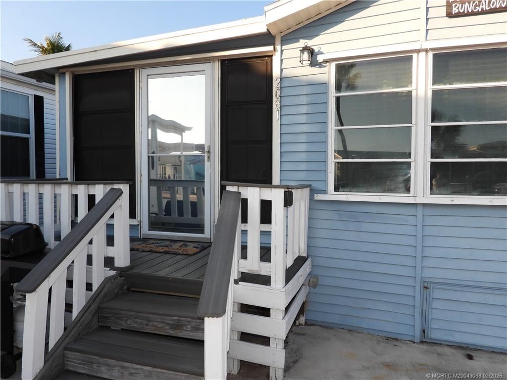 Photo of 2081 Nettles Boulevard, Jensen Beach, FL 34957 (MLS # M20049098)