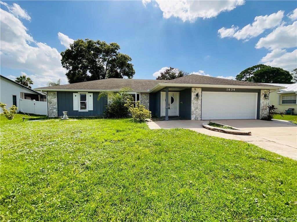 Photo of 1634 SW Gemini Lane, Port Saint Lucie, FL 34984 (MLS # M20056614)