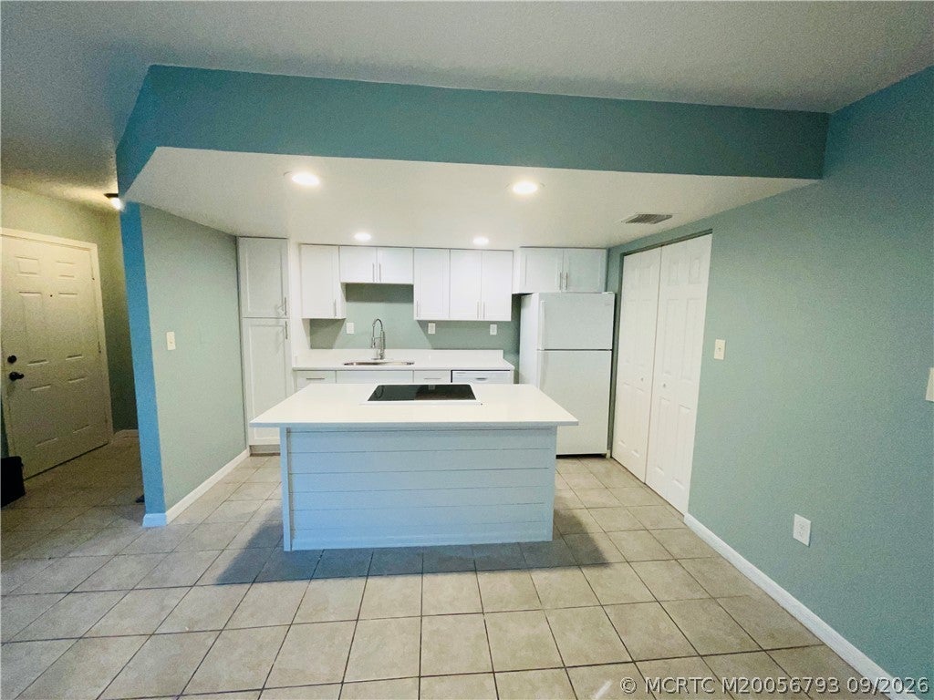 Photo of 1206 Carlton Court #104, Fort Pierce, FL 34949 (MLS # M20056793)