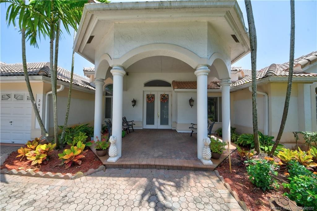 Photo of 2672 SW Glenmoor Way, Palm City, FL 34990 (MLS # M20035010)