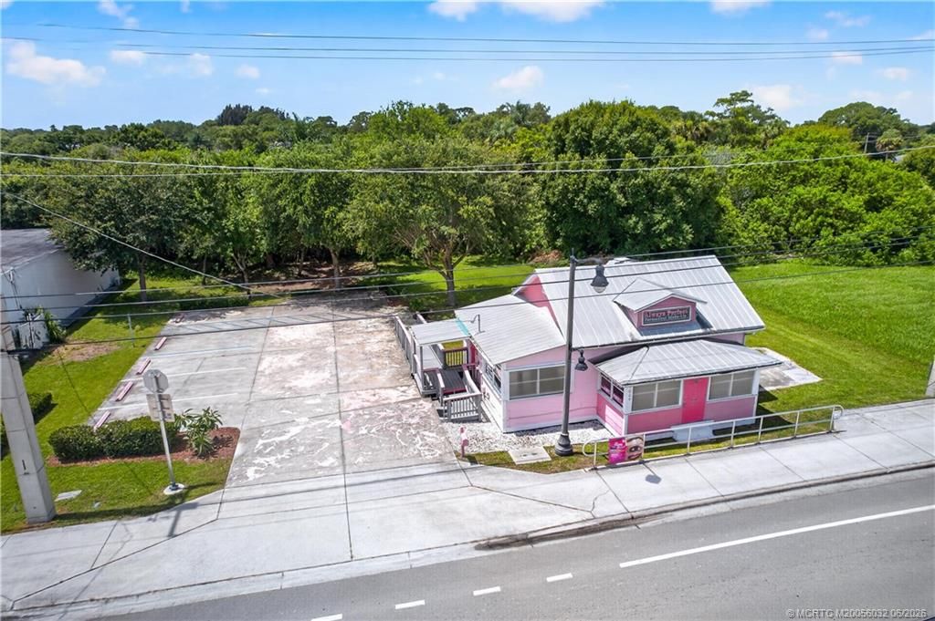 Photo of 1005 W Midway Road, Fort Pierce, FL 34982 (MLS # M20056032)