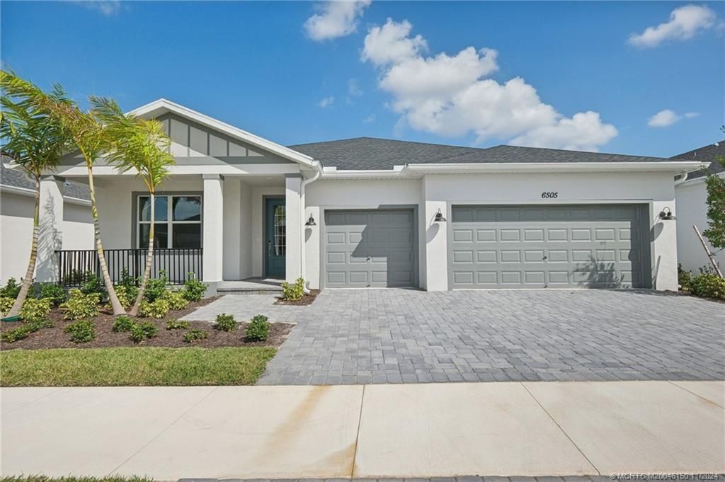 Photo of 6505 NW Cloverdale Avenue, Port Saint Lucie, FL 34987 (MLS # M20046150)