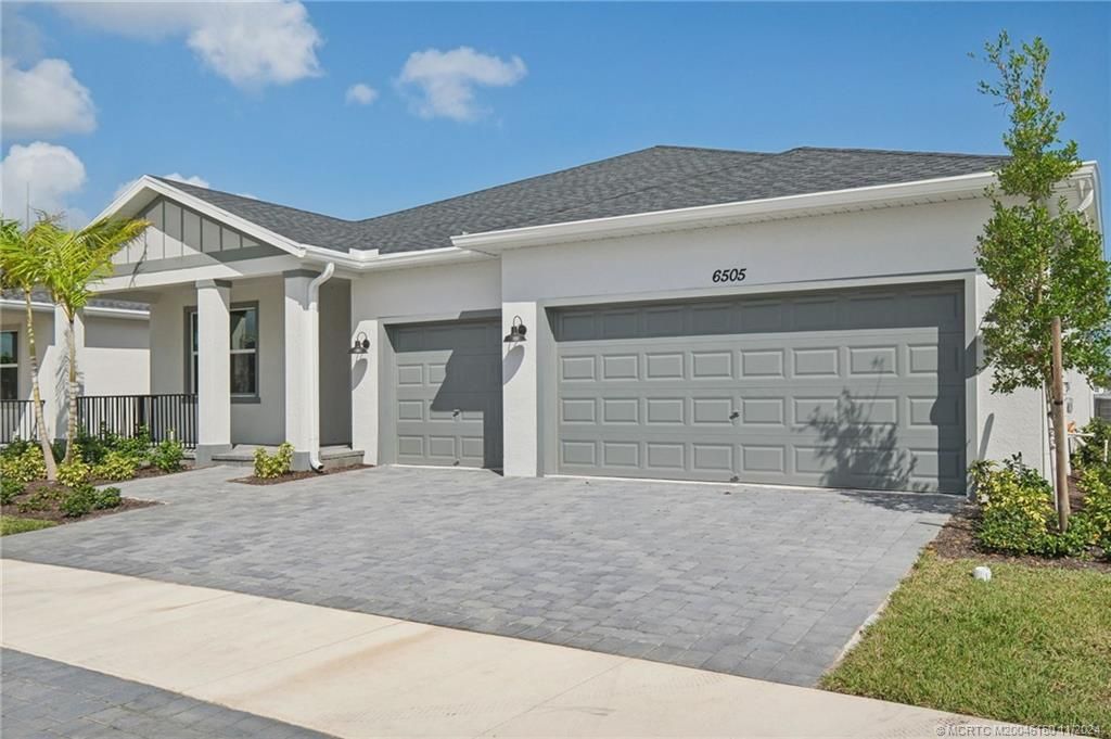 Photo of 6505 NW Cloverdale Avenue, Port Saint Lucie, FL 34987 (MLS # M20046150)