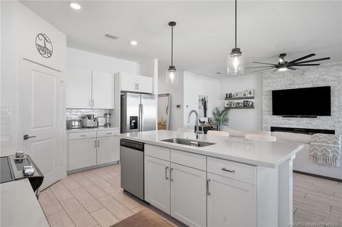 Photo of 2880 NE Breezeway Circle, Jensen Beach, FL 34957 (MLS # M20051837)