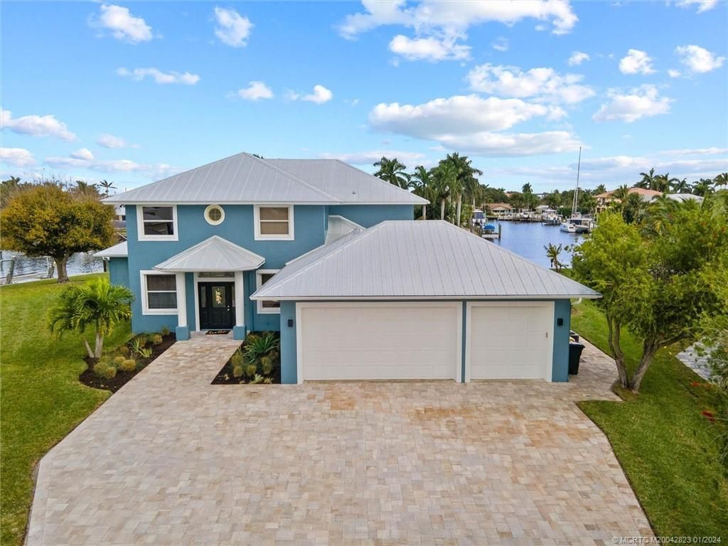 Photo of 1673 SW Boatswain Place, Palm City, FL 34990 (MLS # M20042823)