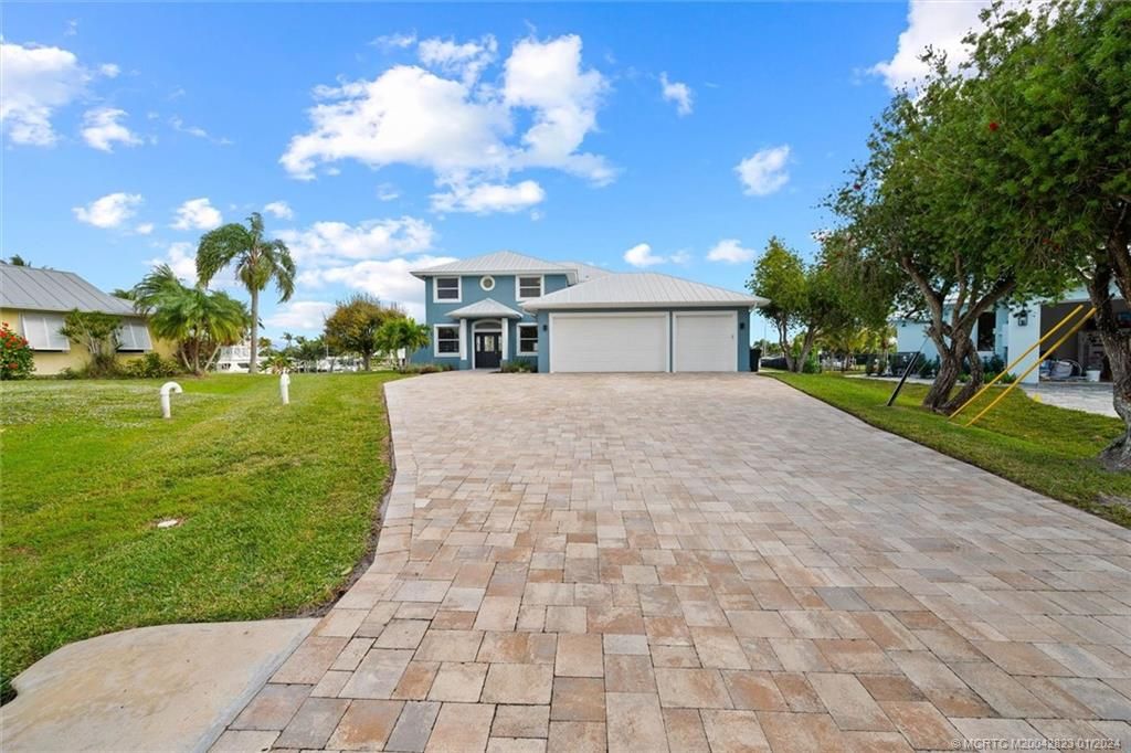 Photo of 1673 SW Boatswain Place, Palm City, FL 34990 (MLS # M20042823)