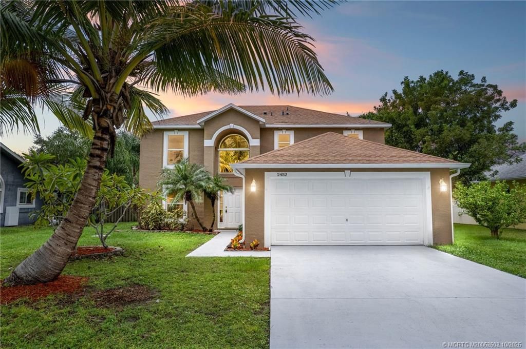 Photo of 2452 SE Victory Avenue, Port Saint Lucie, FL 34952 (MLS # M20052502)