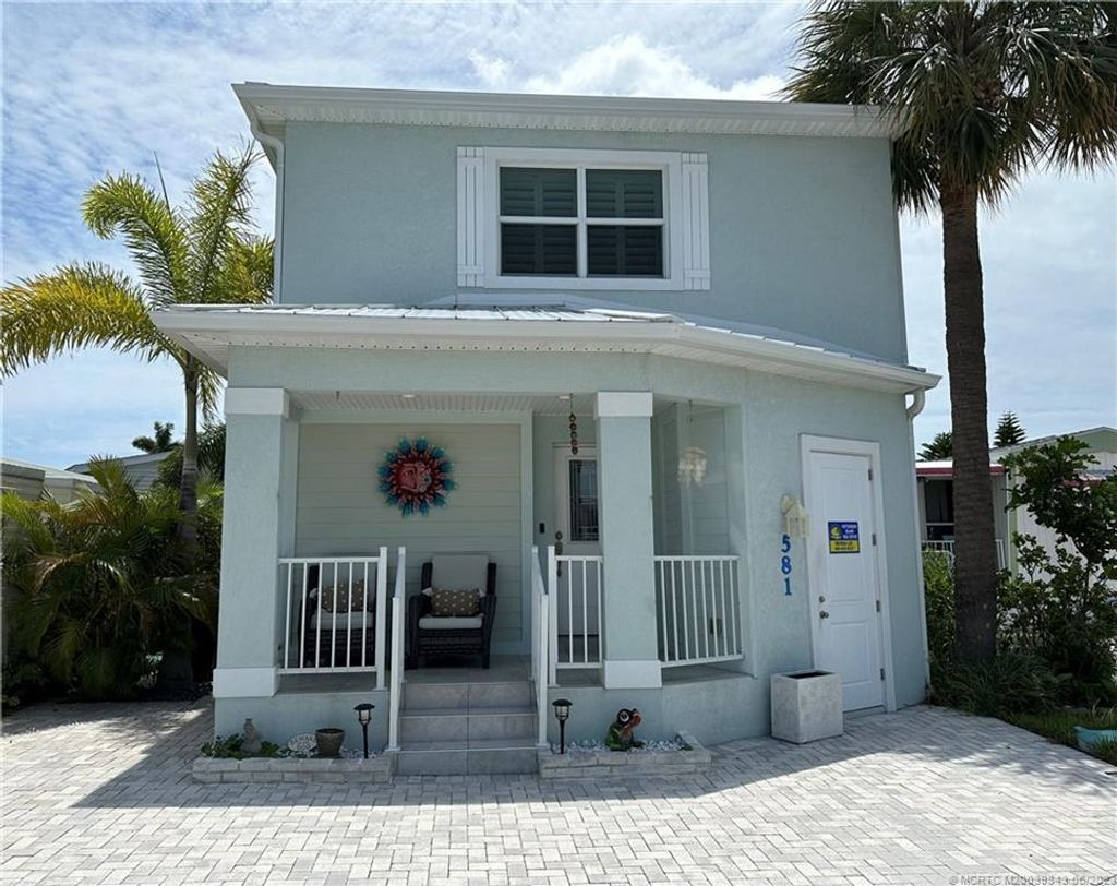 Photo of 581 Nettles Boulevard, Jensen Beach, FL 34957 (MLS # M20039843)