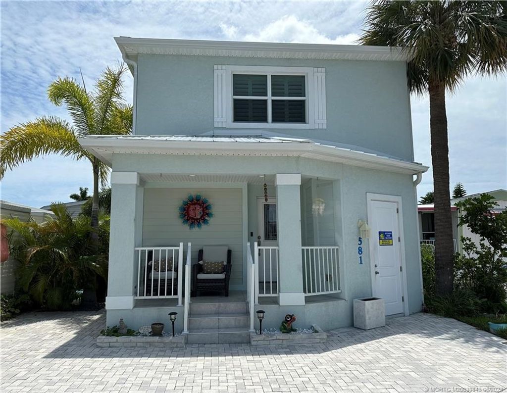 Photo of 581 Nettles Boulevard, Jensen Beach, FL 34957 (MLS # M20039843)