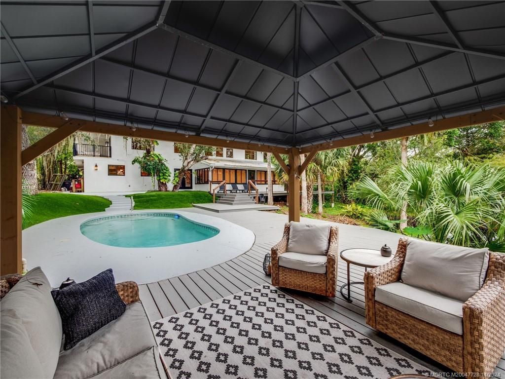 Photo of 3640 SW Wood Creek Trail, Palm City, FL 34990 (MLS # M20047728)