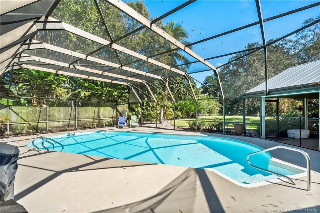 Photo of 1958 SW Winners Drive, Palm City, FL 34990 (MLS # M20053111)
