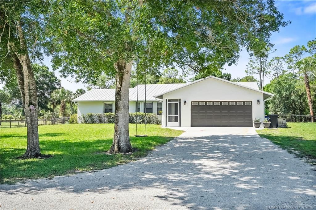 Photo of 5002 SW Ranchito Street, Palm City, FL 34990 (MLS # M20050737)