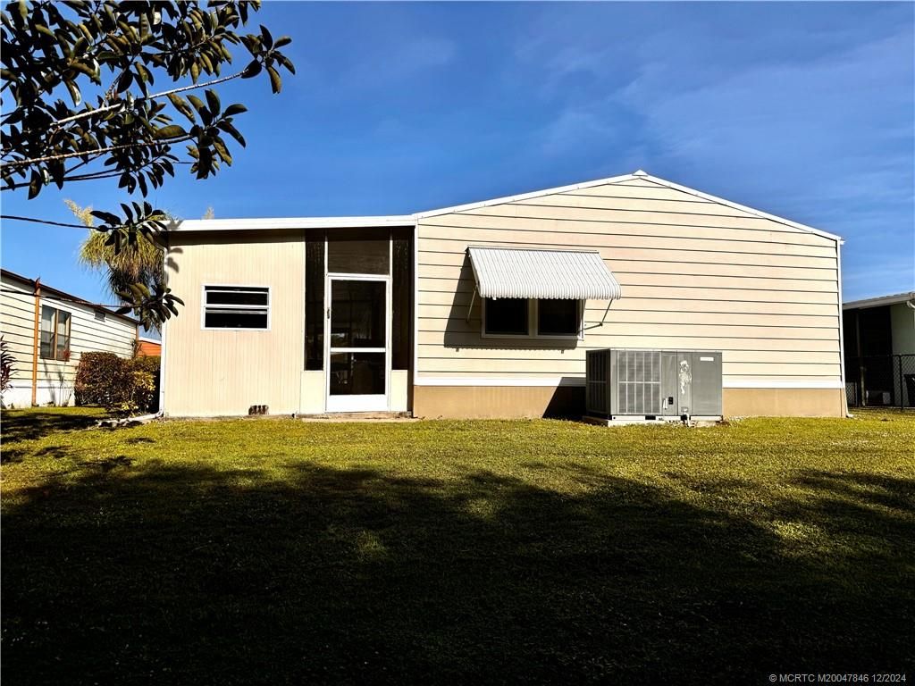 Photo of 8609 Florence Drive, Port Saint Lucie, FL 34952 (MLS # M20047846)