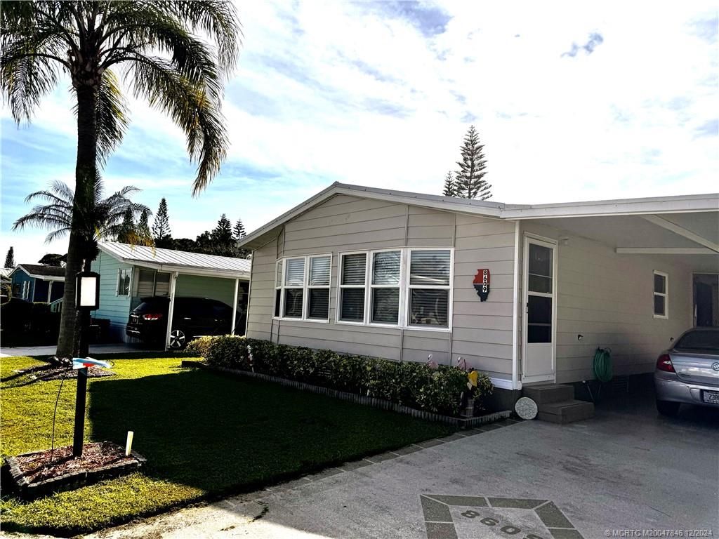 Photo of 8609 Florence Drive, Port Saint Lucie, FL 34952 (MLS # M20047846)