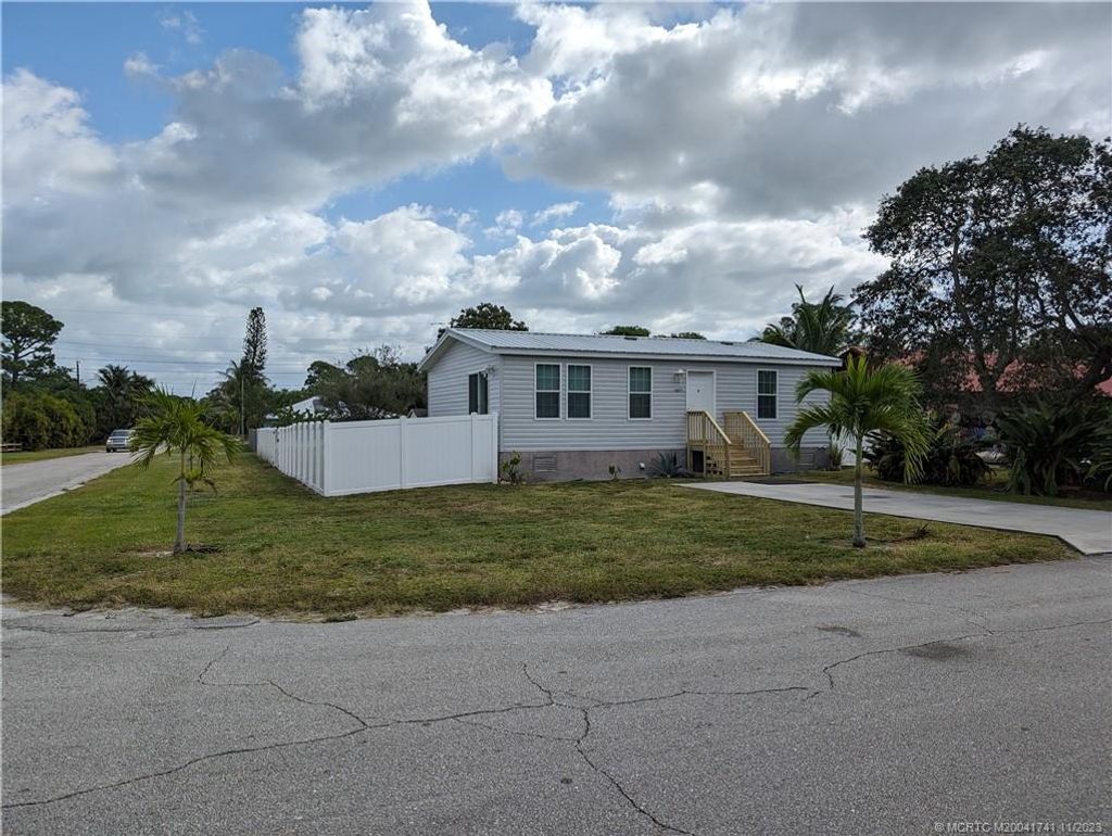Photo of 5277 SE Driftwood Avenue, Stuart, FL 34997 (MLS # M20041741)