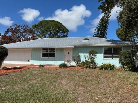 Photo of 921 SW Cairo Avenue, Port Saint Lucie, FL 34953 (MLS # M20054725)