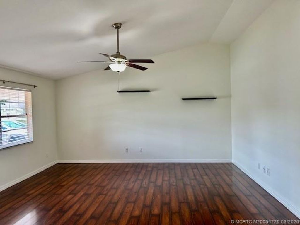 Photo of 921 SW Cairo Avenue, Port Saint Lucie, FL 34953 (MLS # M20054725)