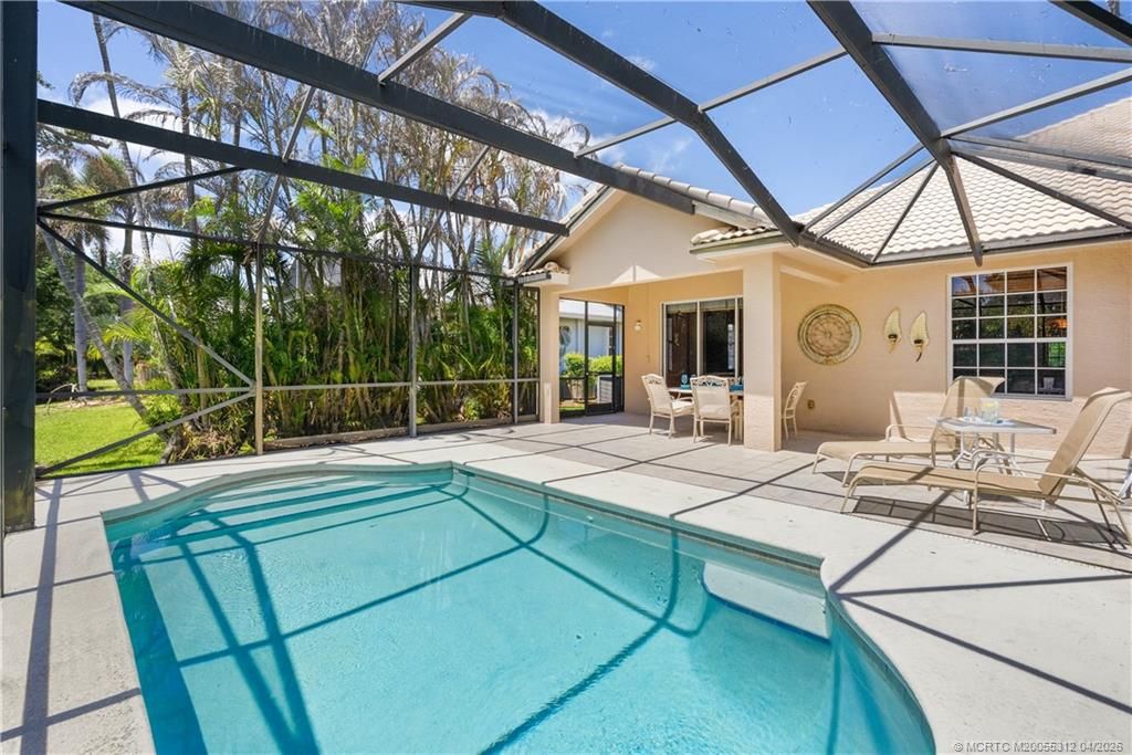 Photo of 830 NW Red Pine Way, Jensen Beach, FL 34957 (MLS # M20055312)